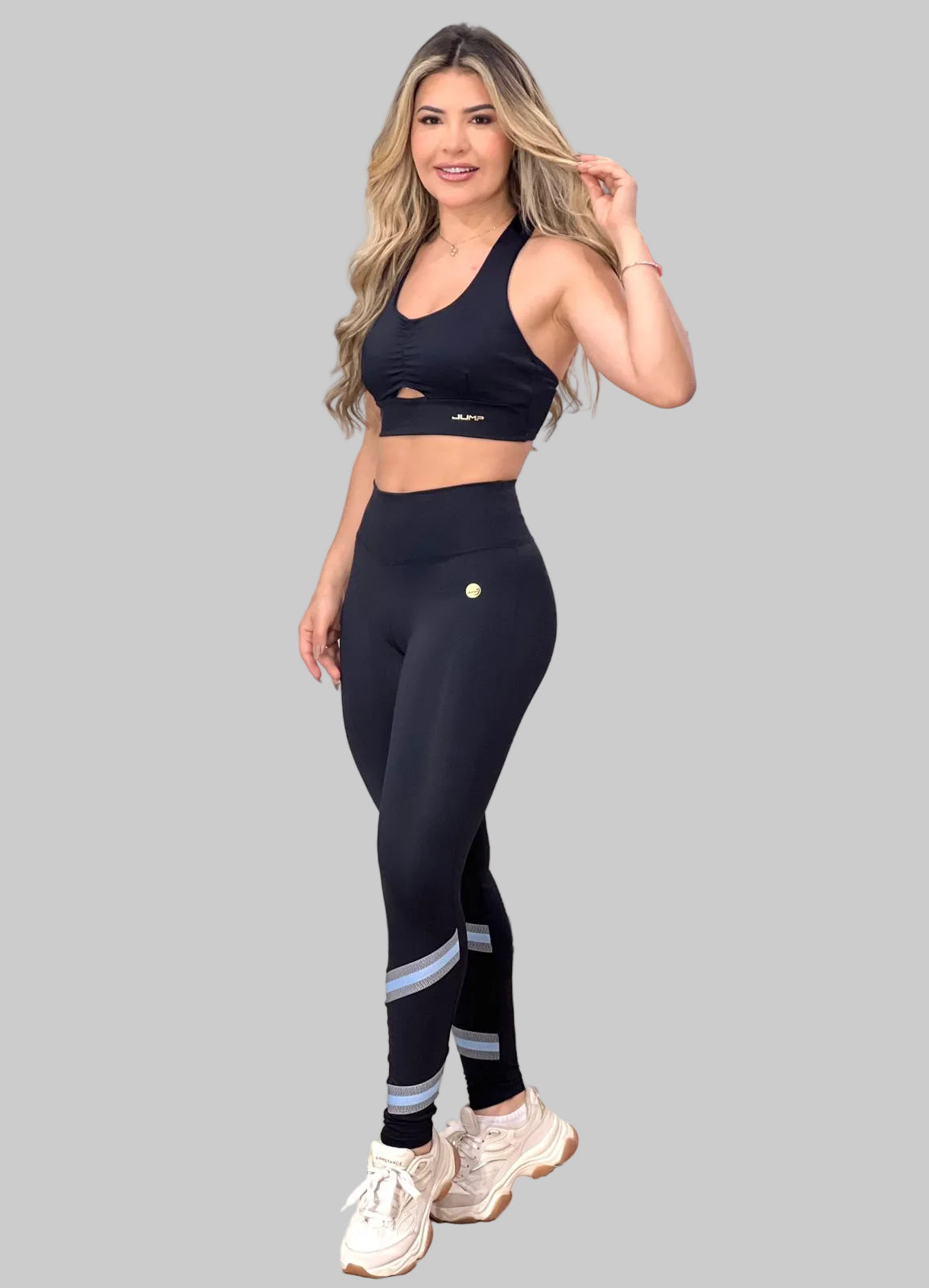 Schwarze Fitness-Leggings mit farbigen Streifen