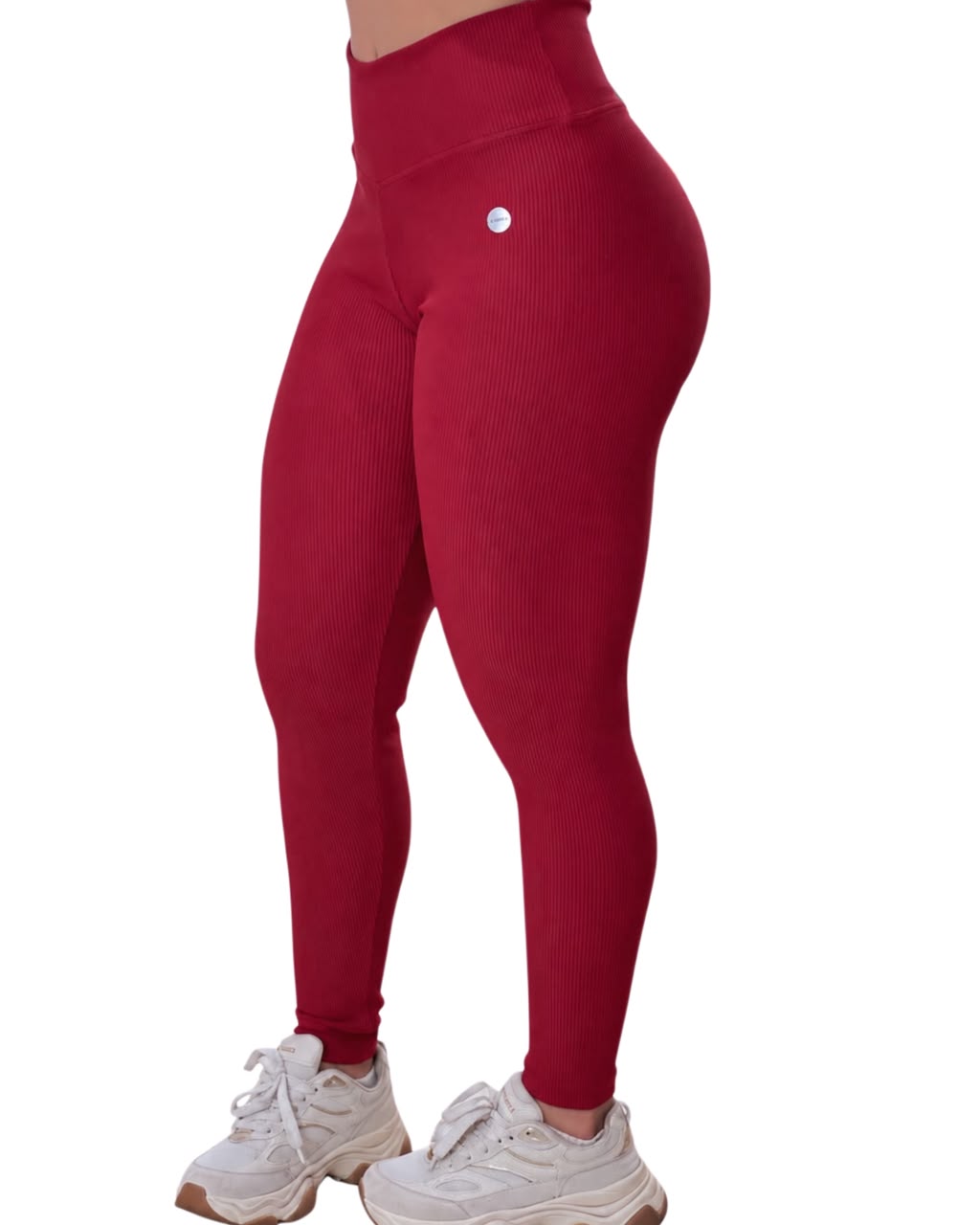 Legging canelada vermelha em fundo branco, vista lateral