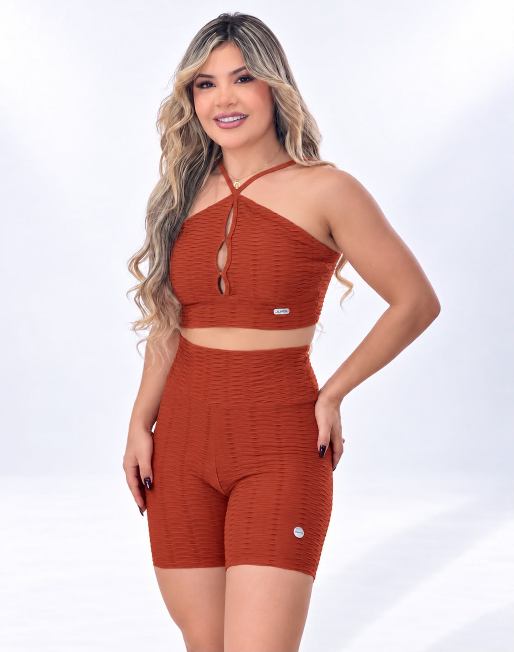 Top Frente Única Ferrugem Texturizado 3D usado com legging do mesmo tecido